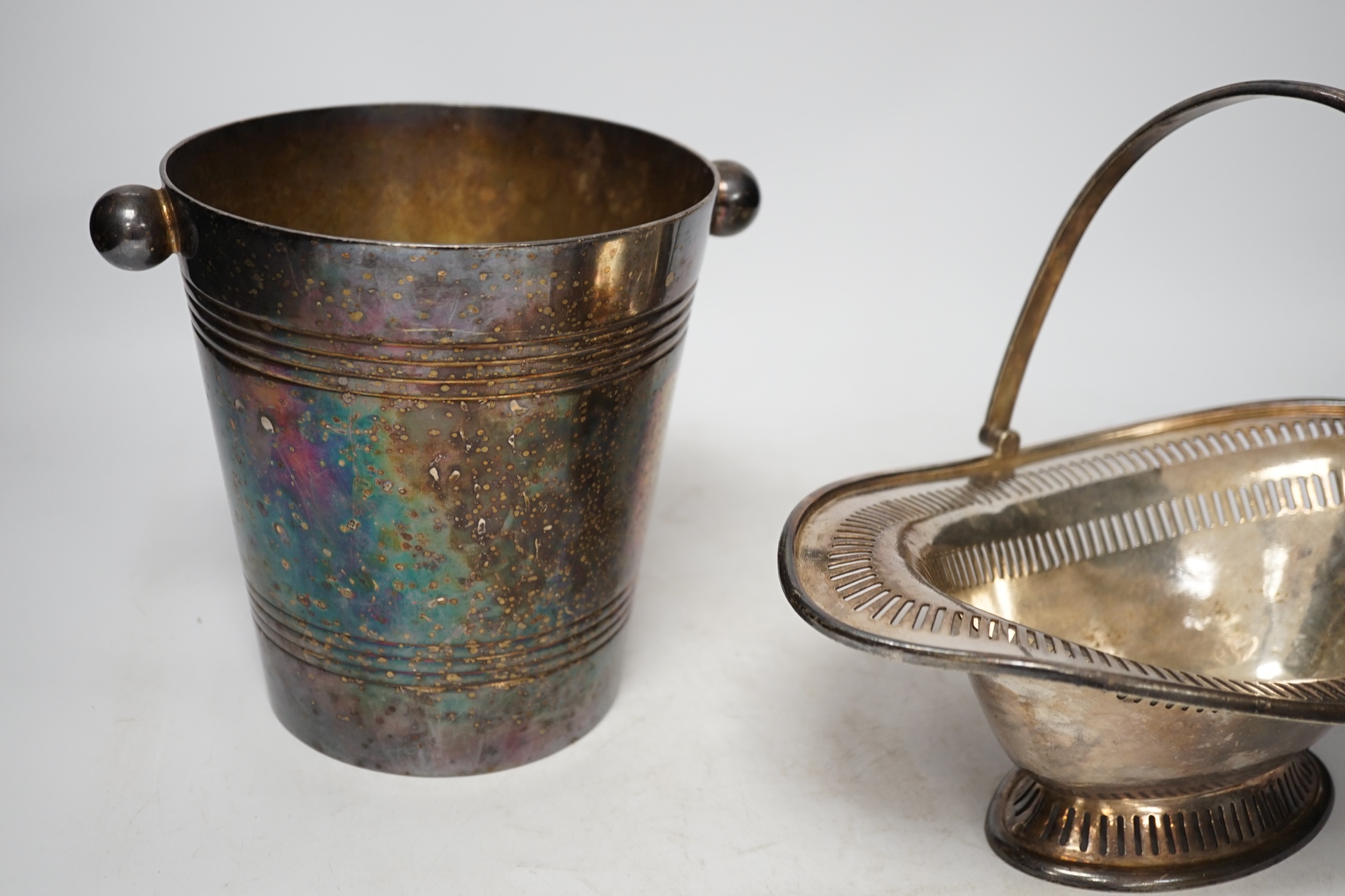 Two Savoy Hotel silver plated items comprising ice bucket and basket with swing handle together with a leather cased travelling picnic tea set. Condition - fair